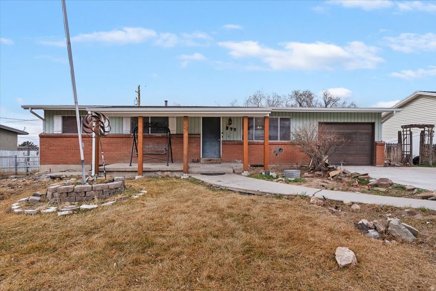 FIXER-UPPER SPECIAL! This home has a lot of potential for the investor or owner willing to put in the TLC. Main level includes 3 bedrooms, 1 full bathroom and a 1 car attached garage.  Basement is partially finished with one completed room that can be used as an office or a bonus room. Basement also has a separate entrance for those interested in putting in a Mother-In-Law apartment. Front porch patio post and roof covering were added when the roof was replaced in 2023. Large .2-acre yard is partially fenced and landscaped. Great Renovation opportunity for a family or investor. Home is being sold As-Is. Come make it yours today!