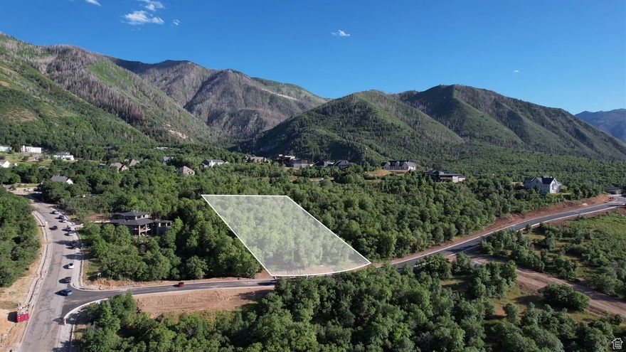 Nestled in the highly sought-after Summit Creek community, this 0.73-acre improved lot-With Seller Financing Available-offers a rare opportunity to build a custom home surrounded by breathtaking mountain, valley, and lake views. Positioned to capture the natural beauty of the landscape, this homesite provides both privacy and a seamless connection to nature. Bring your own builder and create a home that complements the stunning surroundings.  Summit Creek is designed for those who appreciate luxury living with a deep connection to the outdoors. The community features over 80 acres of open space and private hiking and biking trails, ensuring endless opportunities for exploration. Residents also enjoy a beautifully designed clubhouse for gatherings and events, a state-of-the-art fitness center with high-end equipment, three swimming pools and a hot tub, pickleball courts, and a private security team that patrols the community.  This is more than just a place to build-it's a place to belong. Don't miss the chance to own a piece of this premier mountain community.