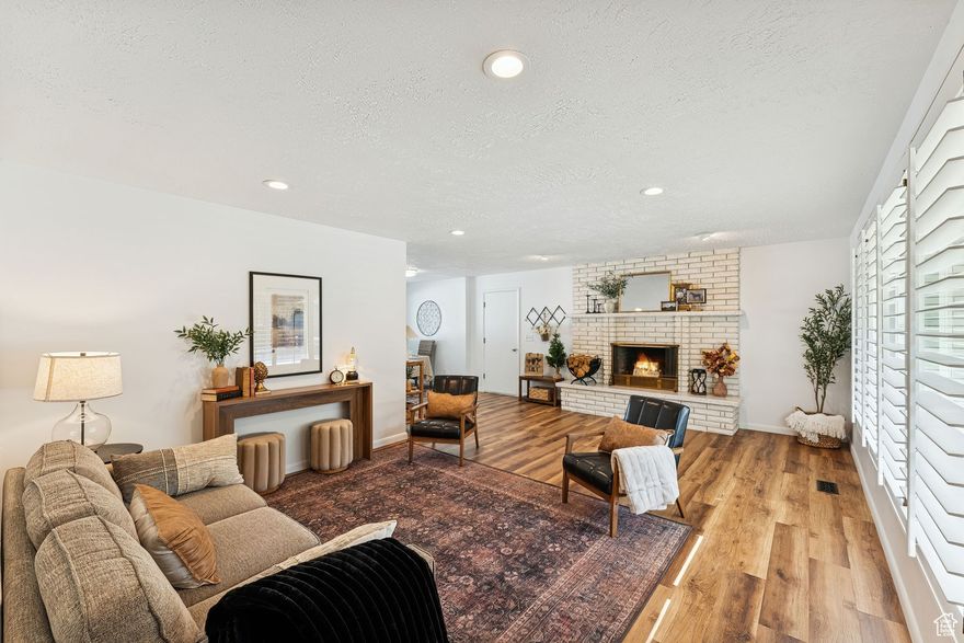 Get ready to fall head-over-heels for this one-of-a-kind home in the coveted subdivision of Quail Valley of Willow Creek! This isn't just a house, it's a legacy. Meticulously maintained by its original owner, this brick rambler is ready to embrace its next chapter  with you at the helm! Forget stuffy formal gatherings (unless that's your thing, then go for it!). You've got a fantastic formal living and dining room, complete with swanky plantation shutters, ready to host your most epic celebrations. But for everyday life? We're talking cozy semi-formal dining and bar  perfect for those "just us" moments. The owner's suite? Prepare to be pampered. Think double vanity for maximum elbow room, a private water closet (because, privacy!), and a walk-in closet just begging to be filled with your fabulous wardrobe. But wait, there's more! The finished basement is where the real magic happens. Two sprawling family rooms await your laughter, movie nights, "man cave", and or just general shenanigans. And let's not forget the laundry room of your dreams and storage galore! Outside? A .21-acre, fenced, corner lot is your own private sanctuary. Picture this: sipping your morning coffee while gazing at the breathtaking mountain views. Or, on those chilly evenings, imagine snuggling up by the crackling wood-burning fireplace. Ahhhh. And for the practical side of you: a spacious two-car garage ready for cars, hobbies, or that "honey-do" list you've been putting off. Plus, you're practically on Alta Canyon Drive! Schools, shops, restaurants, and major roadways are all just a hop, skip, and a jump away. So, what are you waiting for? This gem won't last long! Come see for yourself why this isn't just a house, it's a home waiting to be filled with your memories. Don't miss out!.. Square footage figures are provided as a courtesy estimate only and were obtained from county records.  Buyer is advised to obtain an independent measurement and verify all information.