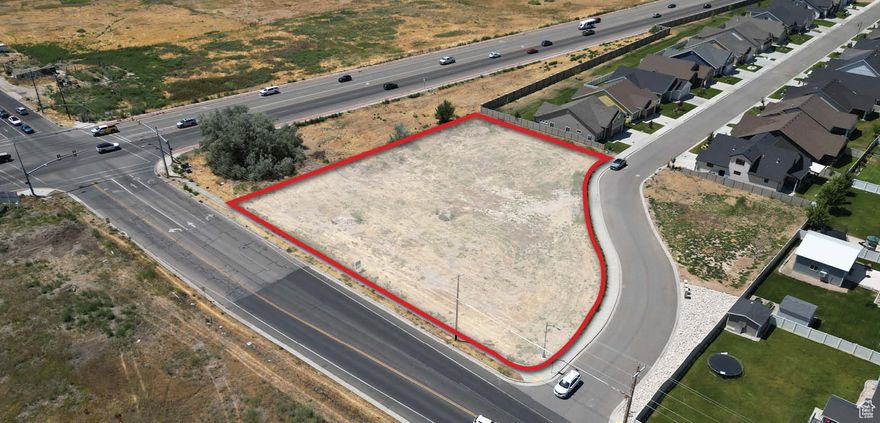 Strategically positioned on the corner of 2700 North and 600 West, this CP-1 zoned parcel offers an outstanding location for medical, retail, or office development. The property is directly across from a newly constructed medical clinic, highlighting the area's momentum as a hub for healthcare and professional services. CP-1 zoning allows for a range of permitted uses, including medical and dental offices, outpatient clinics, pharmacy, financial services, boutique retail, and flexible professional office space.  This section of 2700 North is experiencing active expansion, drawing strong traffic flows and increased visibility. The site benefits from convenient access to major arterials and proximity to established and emerging commercial development, making it well-suited for businesses seeking to capitalize on Pleasant View's growth and the surrounding population base.