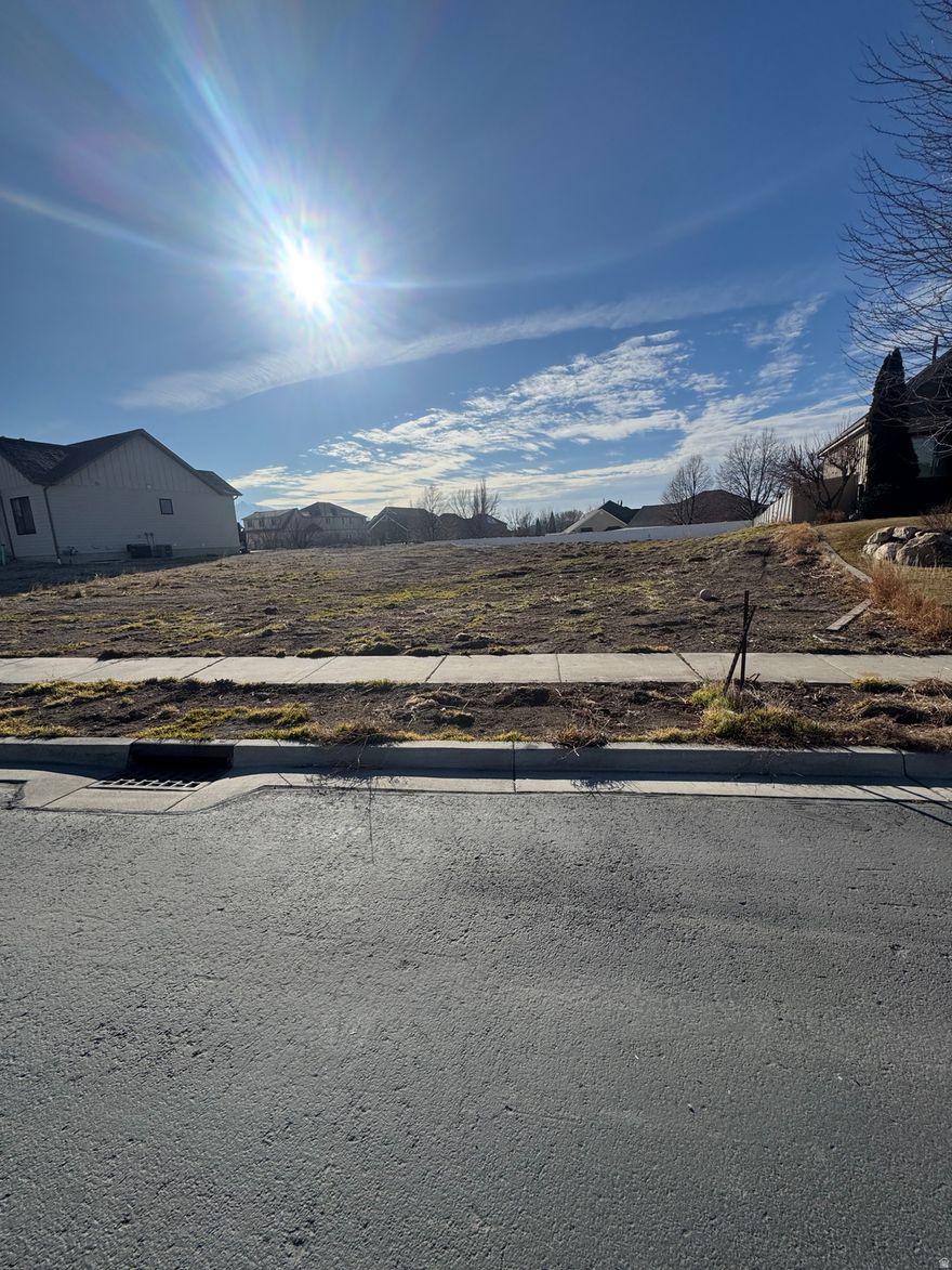 Looking for the perfect place to build your dream home? This beautiful lot offers stunning mountain and Temple views, a peaceful setting with minimal traffic, and close proximity to shopping, eateries, and recreation. You or your builder can bring your vision to life right here.