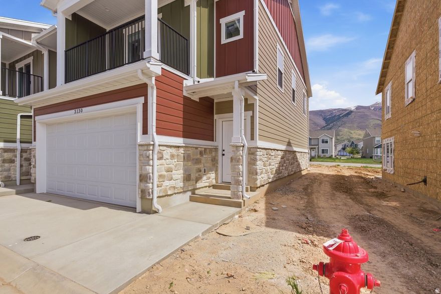 Seller will pay for closing costs and or rate buy down for buyer contact agent for details. Brand-new townhomes in East Layton offering some of the best value in the area. Built by one of Davis County's premier builders, these homes feature upscale finishes and modern design throughout. Highlights include custom cabinets, LVP flooring across the main level, a walk-in pantry, and an oversized primary bedroom with a large walk-in closet. For a limited time, buyers will also receive a refrigerator, washer, and dryer. Don't miss your chance to own a beautiful new home in a highly desirable East Layton location. Every garage is equipped with smart car technology. While we are waiting for various maps systems to update their software with this new development please use these coordinates to find these homes: 4106'19.8"N 11156'02.1"W Check out our website! https://wheatridge-townhomes.com/