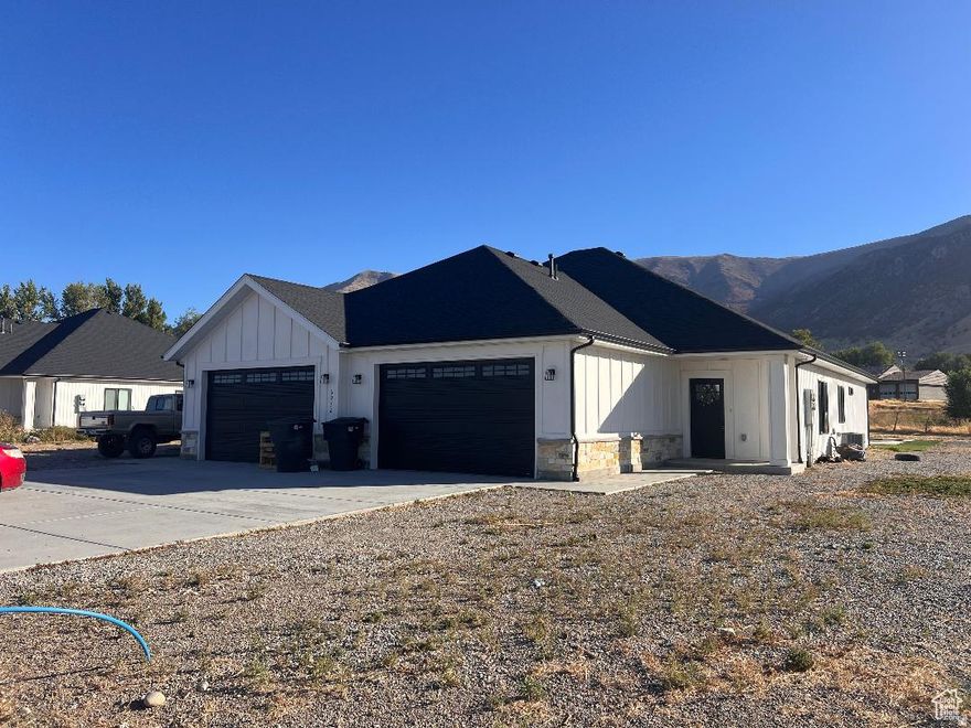 Hard to find newer twin home side  x side.  Single level living.  One half acre lot with synthetic grass. Stainless steel appliances, master bath with double sinks and walk in closet. Easy care laminate flooring. Solid surface counters. RV parking