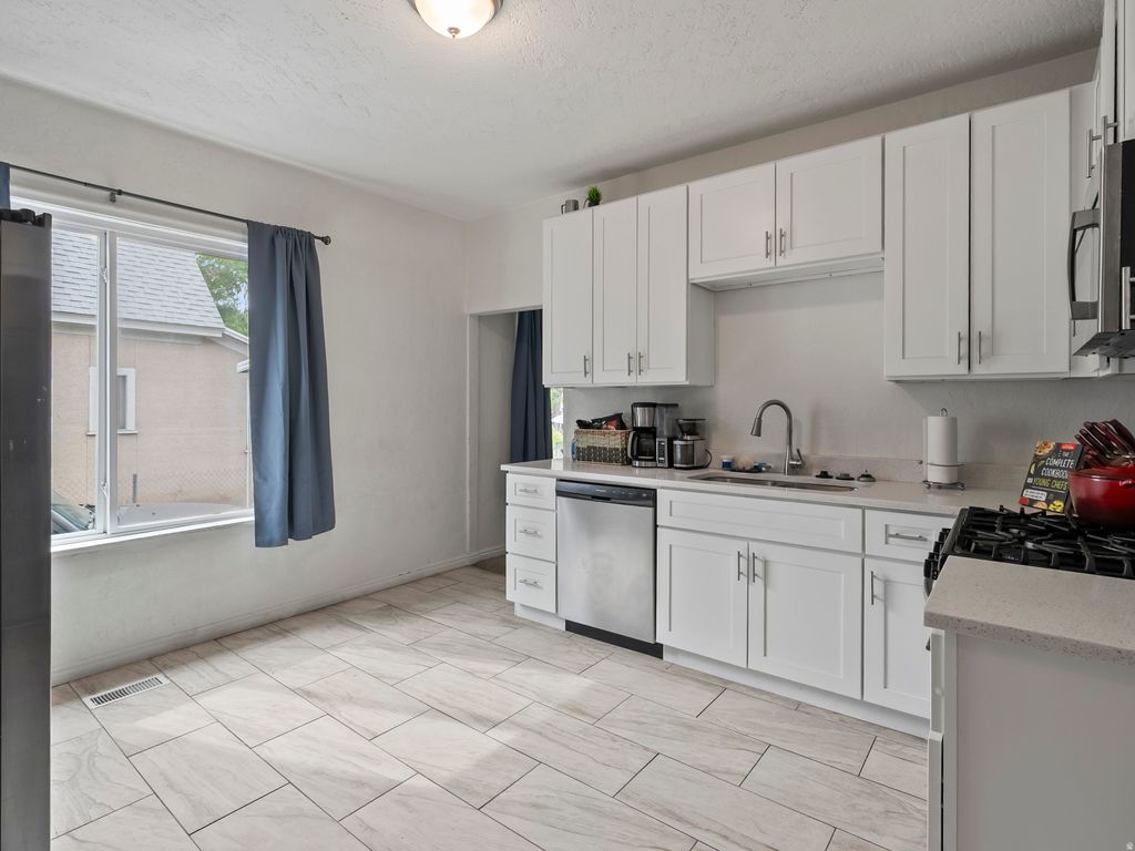 Photo of 510 CANYON RD, Ogden, UT 84404 (MLS # 2153904)