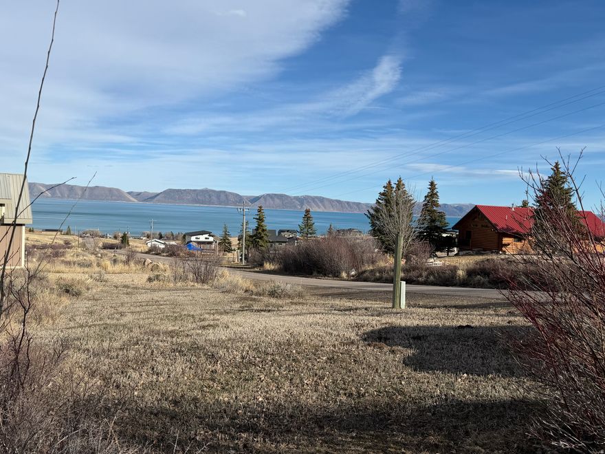 Beautiful 1.03 acre building lot located in Aspen Creek Estates in Fish Haven overlooking stunning Bear Lake. This property offers incredible panoramic Lake and Mountain View's and is the perfect location to build your dream cabin, vacation retreat, investment rental property or year-round home. Enjoy peaceful surroundings with easy access to endless outdoor recreation, including boating, hiking, and miles of nearby ATV trails through Fish Haven Canyon. Conveniently located just minutes from Bear Lake beaches, Marina, and the amenities of Garden City. Survey has already been completed, making it even easier to start planning your build.  A fantastic opportunity to own a prime piece of Bear Lake property with breathtaking scenery in every direction.