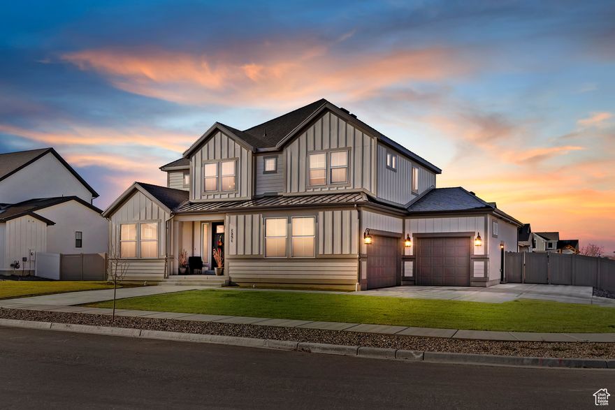 Pride of Ownership reflects both inside and out! Why build when you can move into this custom Two Story home which is in brand new condition! This property shows like a model home, attention to detail is noted throughout this beautiful home! The main level offers a gourmet chefs kitchen with double ovens, 36 inch gas cook top, large center island with granite slab counter tops and back splash and walk in pantry. Semi informal dining room, office/den, great room with gas fireplace, main level master suite with walk in closet with hookups for stackable washer and dryer, separate tub and oversized walk in shower, mud room with lockers off of garage are great for additional storage. Upstairs offers large bonus room with great mountain views, 3 additional bedrooms, 1 of the bedrooms offers an en-suite with full bath and walk in closet and laundry room. Daylight walk out basement is 65% finished and offers large family room and full bath would be ideal set up for a mother-in-law apartment. Oversized 3 car garage with epoxy floors, RV parking, fully fenced yard with auto sprinklers and spacious deck great for entertaining. This home offers many upgrades with reverse osmosis drinking water system in kitchen, digital remote thermostat, floor outlets in office, family room and loft, under cabinet lighting in the kitchen, and gas line for BBQ on the deck! Don't miss out of this opportunity to own this beautiful home. Clinton City is offering Connect Fiber and secondary water is through Davis Weber Canal company.