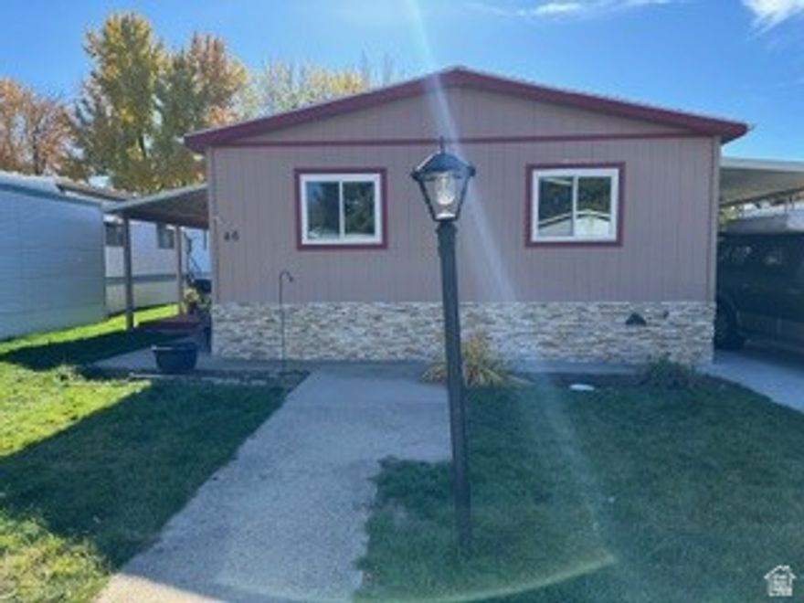 Home is located in a wonderful "over 55 community" which is located in the beautiful city of Fruit Heights. It is ready for a new owner to add a few finishing touches to make it their home. Covered parking. 10X10 Storage shed with a loft for extra storage. Low monthly space rent of $810 and an on-site manager make it the perfect location for quiet living.