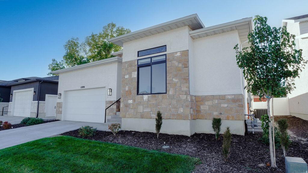 Photo of 12894 S BERLYNN DR #17, Riverton, UT 84065 (MLS # 2138674)