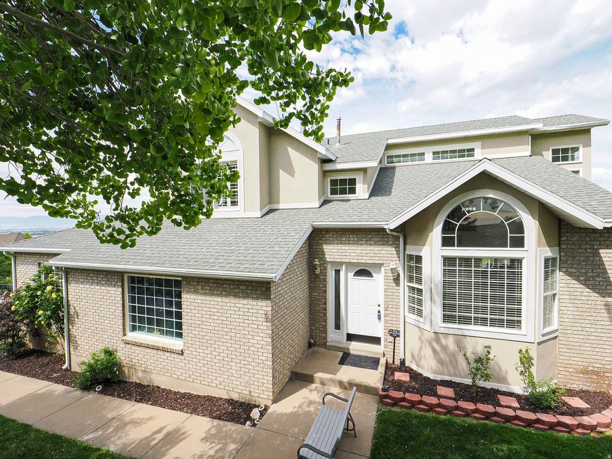 Beautiful home on the East bench with gorgeous views from the multi decks facing West!! Walk out your front door to hiking within a few minutes! Don't miss this charming home with wrap around granite countertops in the chefs kitchen with bar seating and formal dining. Dark cherrywood custom cabinets, all new appliances and fixtures. Master suite with a soaking, jetted tub, dual sinks and a stone fireplace. Theater space with wet bar and walk out to the bottom deck with more views! Multiple storage sheds, zen garden, meticulously cared for inside and out! Square footage figures are provided as a courtesy estimate only. Buyer is advised to obtain an independent measurement.