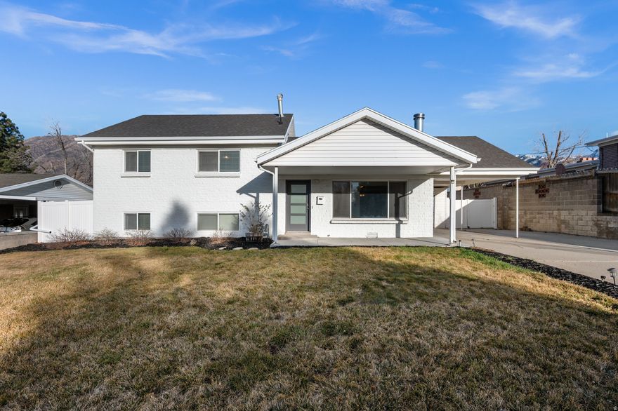Beautifully updated house with an amazing location! Close to the freeway, shopping, restaurants, and the mountains.  New paint inside and out, new flooring throughout, and marble-look quartz countertops in the bathroom and kitchen.