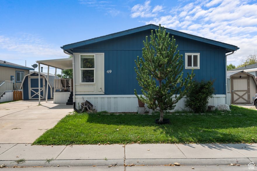 This home is located in the peaceful Oakbrook Crest Manufactured Home Community. If you're searching for a well-maintained double-wide manufactured home in an equally well-kept neighborhood, this property is worth a visit.  Featuring 4 bedrooms and 2 bathrooms, including a spacious primary suite with its own private bath, this home offers both comfort and functionality. Conveniently situated near I-15 freeway access and local businesses, it provides an ideal balance of accessibility and quiet living.  Enjoy affordable homeownership without sacrificing space-this double-wide home offers generous living areas designed to fit your lifestyle.  The pictures don't do it justice-come see it in person, and you'll be glad you did!