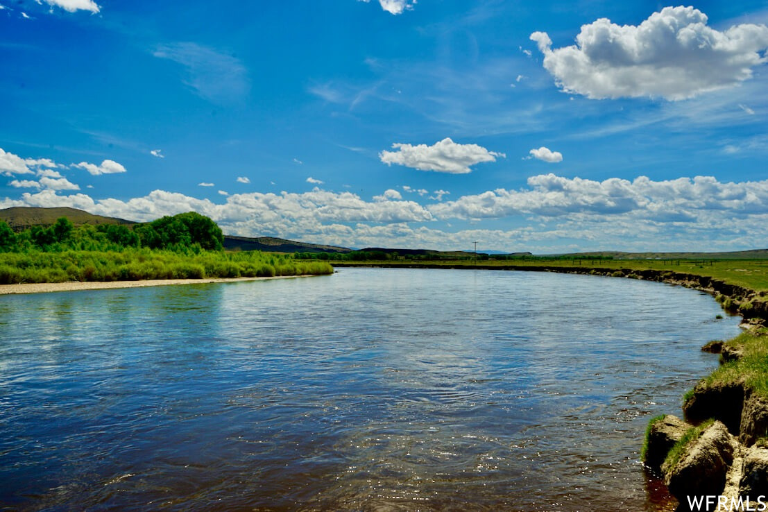 Several miles of the fabled North Platte River grace the southern end of the Haystack River Ranch, just outside of Rawlins, Wyoming. A legendary history of native Americans, fur trappers, railroaders, and outlaws enliven the legacy of this part of Wyoming, and Haystack River Ranch lies in the middle of it all. With over 92,000 acres controlled in a combination of deeded and leased land, this vast property is a proven low overhead cattle operation, with notable fishing and hunting opportunities, along with intriguing investment potential in the domains of energy leasing and environmental credits.  The North Platte River is the key to the productivity of Haystack River Ranch. The river supplies irrigation water for several hundred acres of irrigated and sub-irrigated meadows, which is the mainstay for the cattle operation on the property. In addition, numerous springs and 30 stock ponds keep livestock supplied throughout the ranch property. The ranch occupies the broad North Platte River bottomland at approximately 7000 feet elevation, along with the adjoining uplands and rocky Haystack Mountains. A mix of natural and irrigated grasslands, sagebrush, and rocky outcrops creates a classic "Wyoming mix" of habitat that serves big game herds of pronghorn, elk, and mule deer well. Hunting for these big game species, plus upland birds and waterfowl, is excellent on Haystack River Ranch.  Trout fishermen need no introduction to the North Platte, as one of America's great trout rivers. It is large enough on the ranch to be fished either by floating or wading, and offers resident populations of brown, rainbow, and cutthroat trout, and even some walleye. The presence of sprawling Seminoe Reservoir a few miles downstream means that trophy-sized fish make their way up to Haystack River Ranch on a regular basis. The chances of hiking into fish measured in pounds is very real at Haystack River Ranch! In addition, the famed Miracle Mile of the North Platte is only a short drive away, as well as outstanding stillwater fishing in Seminoe Reservoir itself.