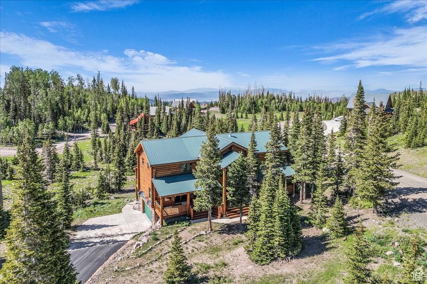 Welcome to your dream cabin retreat! Located just minutes from Brian Head Resort, Cedar Breaks National Monument, and year-round recreational opportunities, this cabin is a four-season haven for outdoor enthusiasts. This spacious cabin offers 3,233 sq. ft. of living space plus an additional 1335 sq. ft. of finished basement and 509 sq. ft. of attached garage for a total of 5,077 sq. ft. Nestled among the towering pines of Brian Head. Stunning, fully furnished turnkey cabin offering the perfect blend of rustic charm and modern convenience!