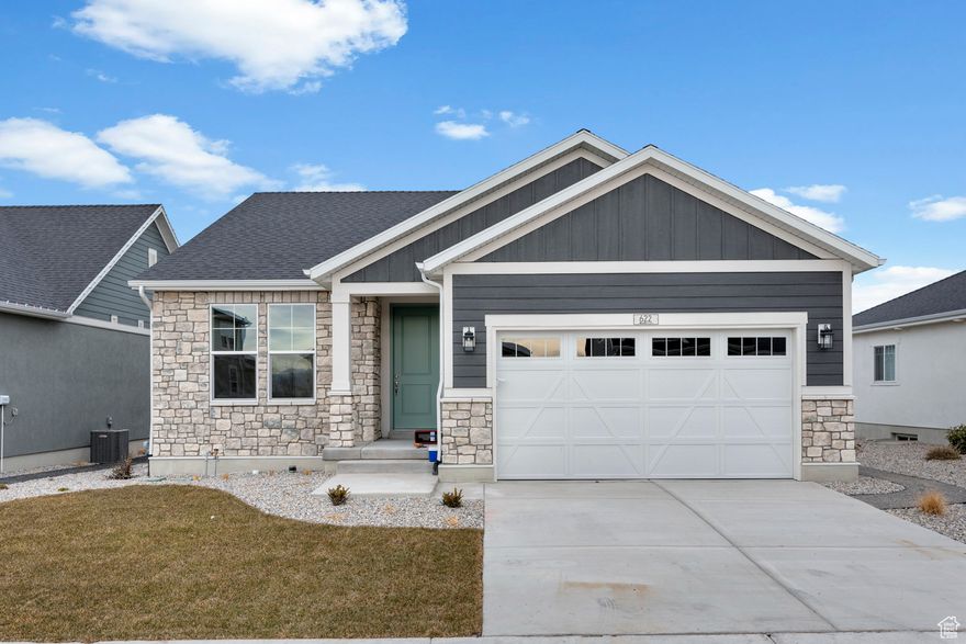 Beautiful brand new Parleys home that is designed for modern comfort and timeless style. Featuring a stylish kitchen with white laminate cabinets, quartz countertops, and stainless steel gas appliances, this home blends elegance with functionality. The flooring includes a mix of laminate hardwood, tile, and carpet, providing durability and warmth throughout. Enjoy enhanced outdoor living with an expanded patio, while can lighting and Christmas light outlets add a touch of convenience. A gas log fireplace creates a cozy ambiance, and wood railing at the stairway adds a classic touch. The owner's bathroom showcases cultured marble shower surrounds, complemented by brushed and satin nickel hardware. Energy-efficient options and a 40-gallon water heater complete this thoughtfully designed home. With two-tone paint and craftsman-inspired details, the Parleys Home is a perfect balance of style, comfort, and efficiency. Comes fully landscaped that is maintained by the HOA for easy care, hassle free living!