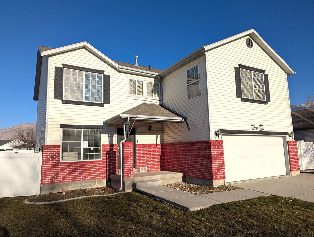 Photo of 501 W WATER WHEEL LN, Stansbury Park, UT 84074 (MLS # 2128130)