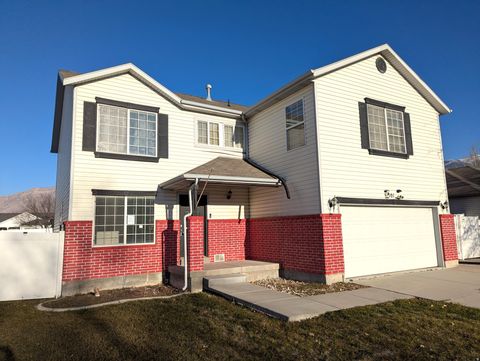 Photo of 501 W WATER WHEEL LN, Stansbury Park, UT 84074 (MLS # 2128130)