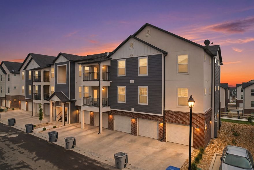 Welcome to this beautifully maintained middle-level condo in the desirable Highridge community of Saratoga Springs! Built in 2023, this move-in ready home offers 3 bedrooms, 2 bathrooms, and an open-concept layout designed for comfortable everyday living. The kitchen features stylish quartz countertops, modern finishes, black cabinet hardware, an electric stove, and flows seamlessly into the spacious living and dining areas. Enjoy the convenience of a private patio, secured building access, attached garage parking, and low-maintenance living with HOA amenities including a clubhouse, pool, pickleball courts, playgrounds, trails, gym, snow removal, water, sewer, trash, and more. Ideally located near The Crossroads shopping area, restaurants, grocery stores, and everyday conveniences. Enjoy quick access to Redwood Road, Pioneer Crossing, and Mountain View Corridor for an easy commute throughout Utah County and Salt Lake County. Nearby parks, walking trails, and Utah Lake recreation make it easy to enjoy everything Saratoga Springs living has to offer. This home also features a smart front door lock for added convenience and security, along with a small linen closet and a separate utility closet providing additional storage and functionality. TV mounts included.