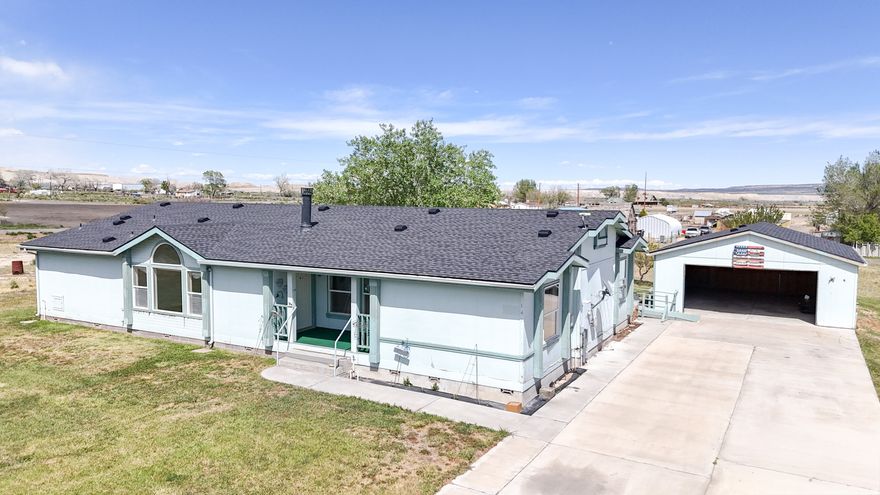 Are you ready to find your haven in a peaceful small-town setting, complete with a spacious home and expansive yard? Look no further. Nestled in the charming community of Emery, this triple-wide manufactured home offers room to live, gather, and grow. Featuring four bedrooms, generous living spaces, a spacious kitchen, and a detached garage, this property is full of opportunity to create the home of your dreams. Enjoy the beauty and adventure surrounding you, with the majestic La Sal Mountains to the east and the rugged landscapes of the San Rafael Desert to the south and west. Small-town living, wide-open spaces, and endless potential await!  Square footage figures are provided as a courtesy estimate only.  Buyer is advised to obtain an independent measurement.