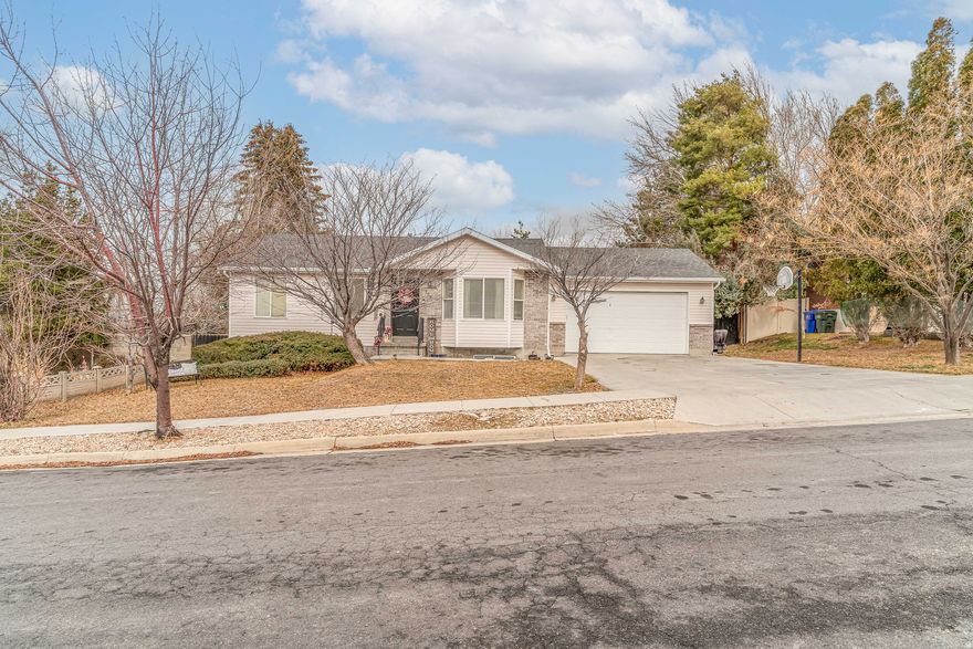 Located in the desirable East Bench, this beautiful 6 bedroom, 3 full bath home is ready for a new family to enjoy and make memories.  Bamboo flooring, tiled bathrooms, finished basement and a great back yard with plenty of privacy and mature trees.  Buyer and buyers agent to verify all.