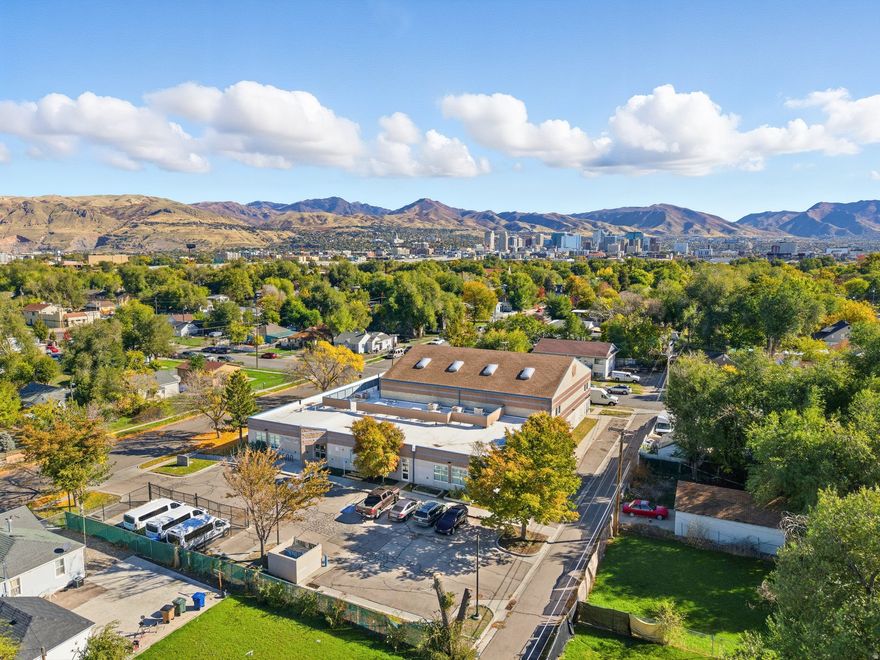 This is a rare opportunity to acquire a highly visible, centrally located "educational" property in Salt Lake City. Currently operated by the Boys & Girls Clubs of Greater Salt Lake, this facility offers nearly 15,000 sq ft of flexible space and sits on a 0.77-acre parcel with surface parking and strong access to transportation corridors. The sale includes the building and land- ideal for school, church, community, or specialty use. With ADA-compliant upgrades, secure access, and an open layout, this property provides immediate functionality and long-term investment potential. For additional details or to schedule a private showing, please contact Clay Winder! As the facility is currently in operation, please do not visit the property without an appointment.