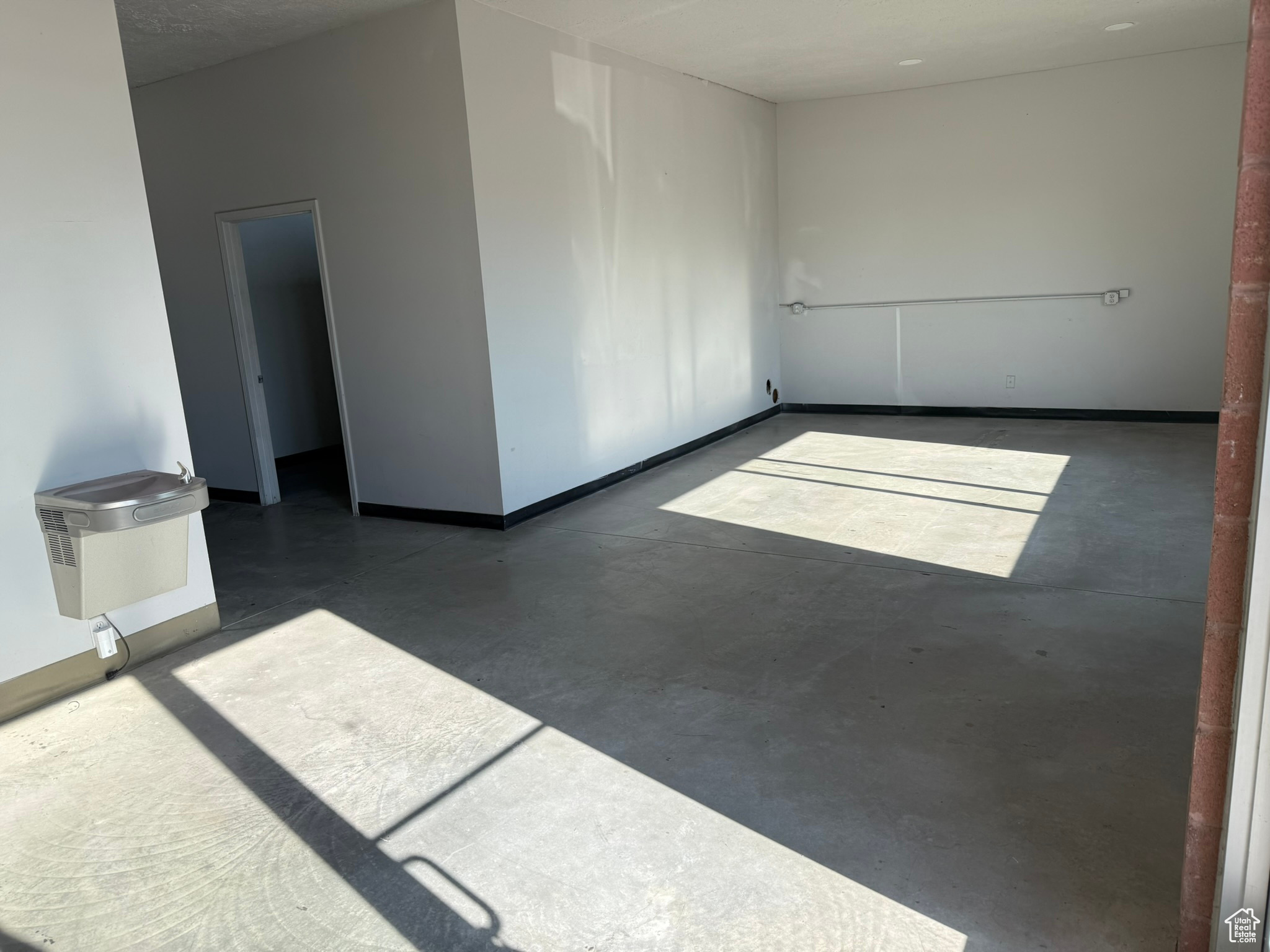 2638 SF of clean warehouse space available September 1st, 2025. This space features an office-quality restroom, a painted showroom/office area, and a workroom. The unit has heat, a 12' x 12' overhead garage door, and 19' 10" of clear height. The rent is $4,240 per month with tenant paying electricity, gas, and internet (all other fees paid by Landlord). Call today to schedule a showing!