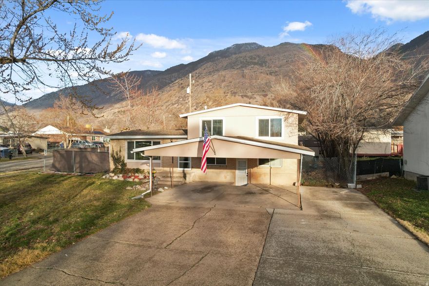 **2.6% VA Assumable Loan!** This well-maintained 4-bedroom, 2-bath home sits on a desirable corner lot with beautiful mountain views. The walk-out basement adds flexible living space, and the fully fenced backyard is ideal for entertaining or pets. AC and furnace were updated last year for added comfort and efficiency. Conveniently located near schools, shopping, and parks.