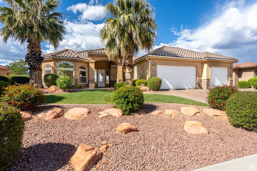 Gorgeous home located in Sky Mountain Golf Estates, backing directly to the golf course with breathtaking, unobstructed mountain and fairway views right out your back door. This beautifully updated home features a remodeled kitchen and bathrooms, stunning new hardwood floors, and resurfaced concrete all around the property. The spacious master suite offers a walk-in shower, soaking tub, dual sinks, and a large walk-in closet. Plus, 1 bed & 1 bath casita! Enjoy the incredible views through the many windows designed to let in natural light and showcase the scenery. Conveniently located near excellent schools, parks, Sand Hollow State Park, sand dunes, and Zion National Park, this home is perfect for those seeking a peaceful retreat with access to outdoor adventures in a friendly community.