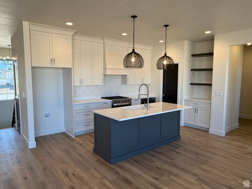 BEAUTIFUL & JUST completed! The open & spacious main level features a gorgeous kitchen with quartz countertops throughout the home, stunning tiled fireplace & large laundry/mudroom area.  Room to grow in the unfinished basement (space for 3 more bedrooms, a full bath, and a rec room).  Enjoy the breathtaking mountain views & covered patio. HUGE 4 car garage, plenty of room for RV/toy parking & all with NO HOA restrictions. 2,000 sq ft of sod and incredible warranty included. SPECTACULAR INCENTIVE....$17,000+ towards closing costs and/or interest rate buy down with our preferred lenders!!!! Come see this home or some of the upcoming homes in this community today!