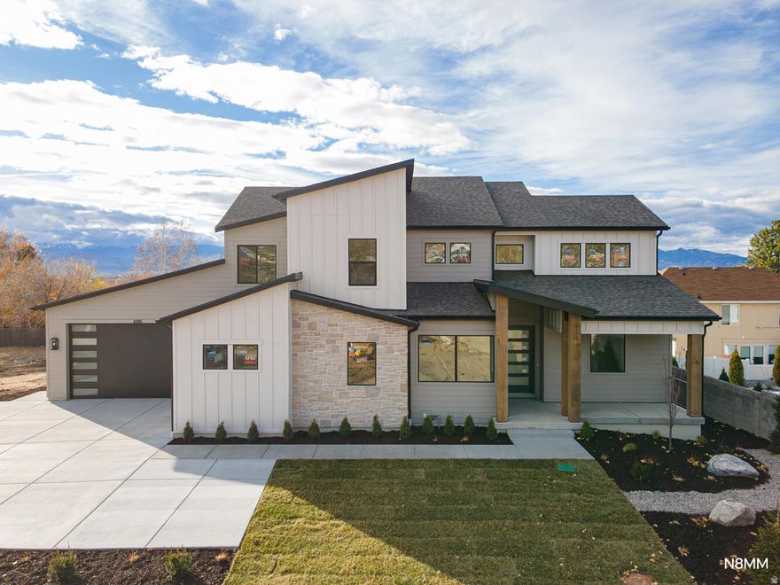 Welcome to Alta Park, an intimate 4-lot enclave perfectly situated across from Alta High School. This home showcases our popular Pinewood plan with a modern flair. Stylish laminate flooring flows throughout much of the home creating a warm and inviting atmosphere. Thoughtfully designed with contemporary touches, the home balances a modern look with cozy comfort. Upstairs you'll find three bedrooms plus a versatile bonus room-perfect for family gatherings or a hang out space for the kids. The fully finished basement expands your living space with two additional bedrooms, a full bath, a spacious family room, and an extra laundry area-ideal for convenience and functionality.  Enjoy easy access to nearby shopping, dining, and everyday conveniences, all while being just minutes from the mountains. This home is scheduled for completion right in time for the New Year.