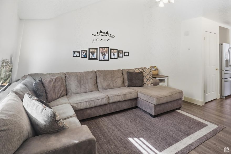 This beautiful, row-end townhome is near a golf course, parks and schools. Recently updated LVP flooring and carpet throughout. Plenty of light through windows makes the home feel warm and inviting. Lower level has a family room, kitchen, dining, laundry and half bath with a back patio leading from the dining. Home also has central vacuum. Upstairs has two large bedrooms and bathroom. The home has a detached garage directly in front of the home with an additional reserved parking space. The community comes with a playground, sidewalks and plenty of outdoor space. Water heater is 3 years old. Home warranty included. Qualified buyers may receive a 1-0 temporary buydown (resulting in 1% lower interest rate for the first year) when using the seller's preferred lender.