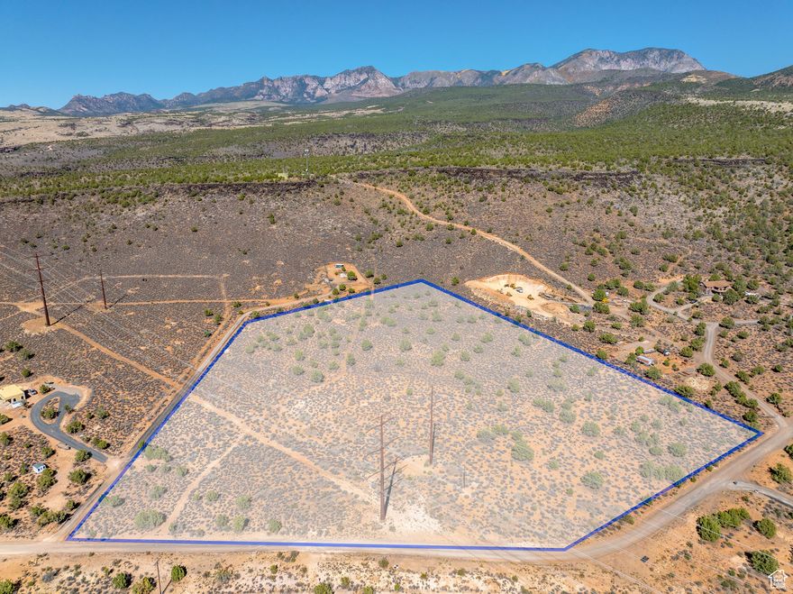 Public Remarks: Build your dream home on this exceptional 13.07 acres in Diamond Valley! This property includes 1.5 acre-feet of water and has all utilities stubbed to the lot, making the building process seamless. Septic system is pre-approved, and both the hookup fee and Diamond Valley Water Conservancy District connections have already been prepaid. The lot's gentle upward slope offers breathtaking panoramic views, stretching for miles and overlooking the beauty of Snow Canyon State Park. With no HOA restrictions, you can bring your own builder and design the home you've always envisioned. A rare opportunity in a serene setting with endless potential!