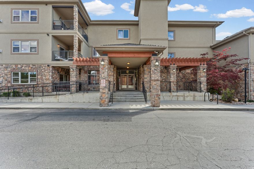 This home is not currently FHA approved. However, check with your lender/realtor to see if an FHA spot approval is possible for your situation. Welcome to this incredible top-floor condo in the heart of Sugar House, perfectly positioned in one of the most desirable locations in the Salt Lake Valley. The location is truly second to none, placing you just minutes from Sugar House Park, the Salt Lake Country Club, Bonneville Golf Course, shopping, restaurants, Macey's, Walmart, Foothill Boulevard, I-80 access, and more. Whether you are commuting or enjoying the vibrant local scene, everything you need is right at your fingertips. Located in a secure building with elevator access, this top-level unit offers both comfort and convenience. As you step inside, you are immediately greeted by beautiful hardwood floors and a bright, open-concept layout that feels both modern and inviting. The kitchen is a true centerpiece, featuring quartz countertops, a large peninsula with bar seating, tile flooring, pendant lighting, a gas range, stainless steel appliances, and an abundance of natural light. The spacious family room flows seamlessly from the kitchen, creating the perfect environment for entertaining or relaxing, complete with a cozy fireplace and access to a charming Romeo and Juliet balcony. The primary suite is oversized and filled with natural light, offering tall ceilings, hardwood floors, a large closet, and a well-appointed en-suite bathroom with tile flooring, a modern vanity, and a tiled shower. An additional bedroom provides excellent flexibility for guests, a home office, or both, while the second full bathroom features tile flooring, a tiled shower, and updated finishes. This community offers an impressive list of amenities, including secured garage parking, ample guest parking, a dedicated storage unit, elevator access, a theater room for movie nights, a fully equipped fitness center, a community room with kitchen, pool table, and lounge space, as well as secure mail and convenient trash chutes. This is a rare opportunity to own a top-floor condo in one of Salt Lake's most sought-after neighborhoods, combining location, lifestyle, and low-maintenance living in one exceptional package. Schedule your private showing today. Buyer and Buyers agent to verify all information. Square footage figures are provided as a courtesy estimate only. Buyer is advised to obtain an independent measurement.