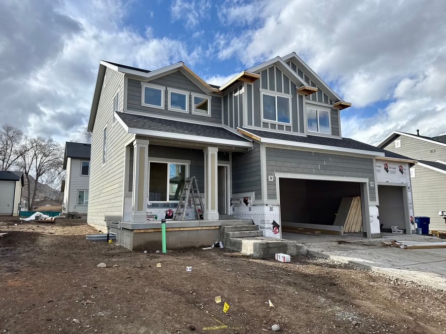 Brand-new two-story home in Magna with modern finishes and thoughtful design. Kitchen features soft-close painted cabinets, quartz countertops, waterproof LVP flooring, a large island, and walk-in pantry. Upstairs offers four spacious bedrooms and a large laundry room. Unfinished basement allows room for two bedrooms, a bathroom, and family room. Includes 3-car garage, cultured rock exterior, and front porch. Easy access to Hwy 201 and Salt Lake City. Move-in ready.