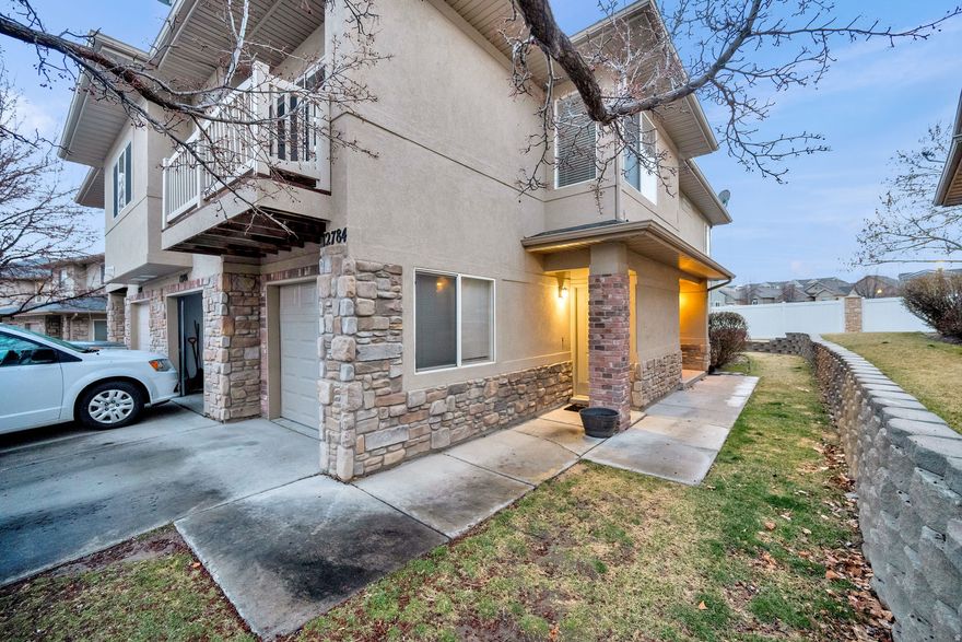 *OPEN HOUSE THIS SAT MARCH 7, 11-1:30PM* Darling Riverton townhome near The District!  Updated 2 bed/ 2 bath, with open floor plan, recessed lighting, built in surround sound & 9' ceilings. 2 Eastern-facing balconies with Mountain views, an attached garage & guest parking for convenience. Fresh 3-tone paint throughout, brand new lush carpet, new furnace, AC & garage door!  Laundry units included! HOA pays water! Resort-style amenities: Club house, pool, spa, gym, park, trails. Perfect central location, near Mountain View Corridor & Bangerter Hwy, shopping/dining/rec center!  Info deemed reliable, Buyer & Buyers agent to verify all.