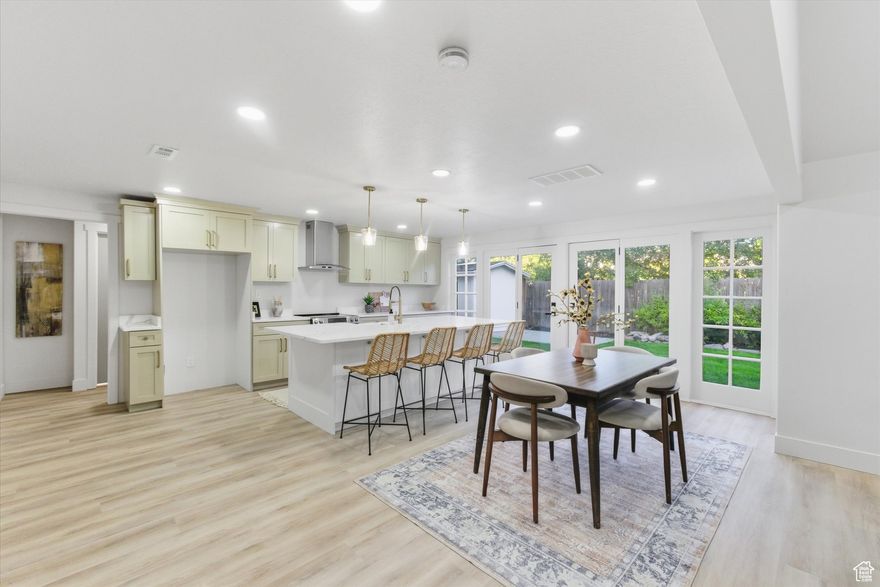 Welcome home to a space that's as fresh as it is functional. This beautifully remodeled single-level home offers 3 bedrooms, 2 bathrooms, and an open layout with vaulted ceilings and a full wall of windows that fill every corner with natural light. The gourmet kitchen is ready for both your weeknight dinners and weekend get-togethers, designed to impress and built to enjoy.  If you're not looking to lift a finger, this home is for you, every detail has already been done. Outside, you'll find a private backyard and side yard that's perfect for entertaining, relaxing, or simply enjoying a quiet evening under the stars.  Located close to St. Mark's Hospital, Brickyard Plaza, freeway access, Scott Ave Park, and so much more, you'll love how convenient life feels here.  Modern comfort, unbeatable location, and zero to-do list, this Millcreek home has it all!
