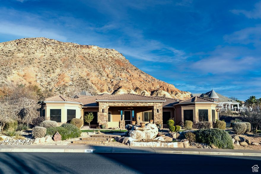 Southwest charm!  Over 1/2 acre xeriscaped grounds.  A split floor plan for both privacy & comfortable gathering areas. Large common area anchored by a gourmet kitchen w/ample heavy custom stone countertops.  Adjacent great room features 2 sitting areas, kiva fireplace & dining room (or a great 2nd office-music room). 3 bedrooms, a full bath & laundry are located opposite of the principal suite, 1/2 bath & private office complete w/safe. Outdoor spaces abound front & back yard w/gazebo.  Oversized 3 car garage, + huge 42' deep RV garage. Instant hot water heaters, softener, RO system & Ring (TM) doorbell system.