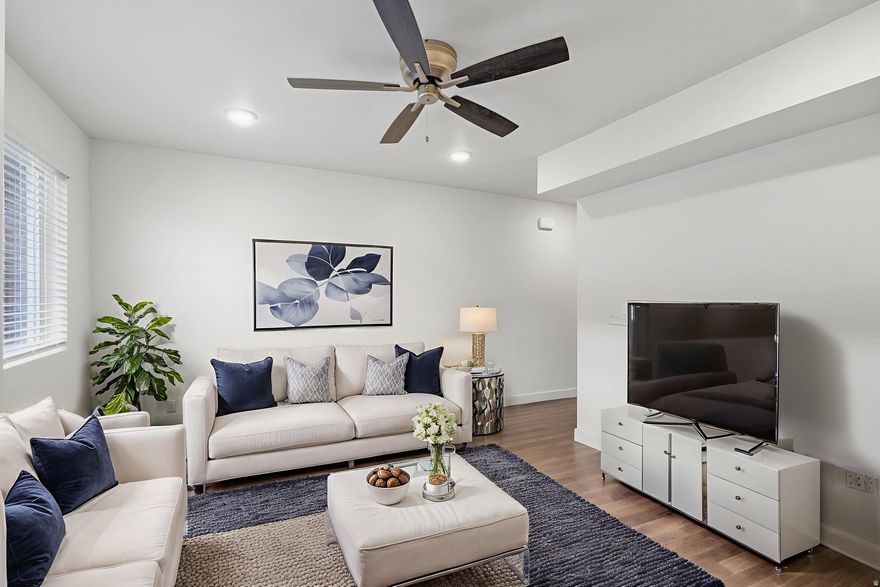 Building equity in your brand-new home is more achievable than you think. This stylish mid-row townhome is designed with light-filled living spaces and a layout that feels open and comfortable. It offers three spacious bedrooms, two and a half baths, and thoughtful finishes like granite countertops, stainless steel appliances, luxury vinyl plank flooring, and integrated smart home features including programmable thermostats, door locks, and lighting. The attached garage adds both convenience and storage. Situated in The Villas at the Point on 12th Street, you're just minutes from I-15, shopping, dining, and everyday essentials. The swimming pool, clubhouse, and playground are scheduled for completion in 2026, adding long-term value to your investment. The HOA covers high-speed internet, sewer, water, garbage, insurance, and smart home services. Perfect for first-time buyers or renters ready to make the leap into ownership. Map Coordinates: 411440.6"N 1115911.2"W. (Next to El Paisa Grill Restaurant). Buyer to verify all listing information.