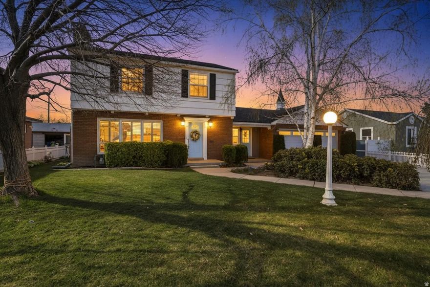 This charming Midvale home has the kind of feel that makes you smile the second you pull up. From the classic white picket fence to the inviting curb appeal, it has a warm, welcoming presence that is hard to find. Inside, you'll find a comfortable layout full of character, with original hardwood floors, a cozy gas fireplace, built-in shelves throughout the home, and thoughtful updates in the kitchen and bathrooms - including a high-end Bosch dishwasher - that make the home feel both timeless and functional.  One of the true highlights is the incredible workshop/garage space. Whether you love woodworking, need room for projects, want extra storage, or just appreciate having space to create, this area opens up a lot of possibilities and offers excellent flex space for hobbies, a studio, or other future uses. Out back, the large yard gives you plenty of room to relax, entertain, garden, or simply enjoy your own space.  With meaningful updates already done and a location that keeps you close to shopping, dining, and quick freeway access to both I-15 and I-215, this home offers more than just square footage. It offers comfort, flexibility, and a place that truly feels like home.  Square footage figures are provided as a courtesy estimate only and were obtained from County Records. Buyer is advised to obtain an independent measurement.