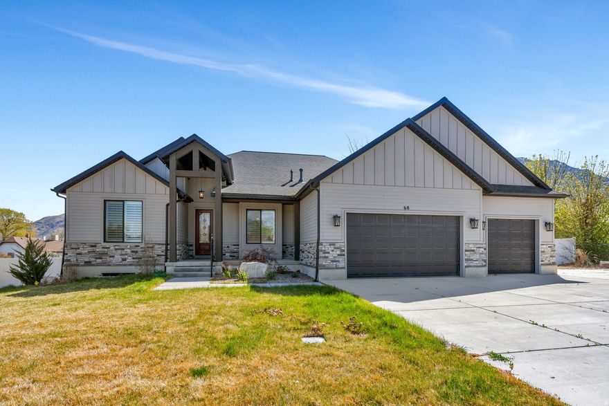 Beautiful, newer home located in central Santaquin. Situated on a half-acre lot, this property offers a quiet, historic country feel with easy access to the freeway entrance, Macey's, and local restaurants. The location is also perfectly walkable to Main Street.  The home's interior features vaulted ceilings and large rooms on the main floor. The primary suite includes a spacious bedroom, a standalone tub, and a closet that conveniently connects to the main-floor laundry. Additionally, the basement provides an excellent opportunity for customized finishing.  The outdoor space is a highlight of the property, featuring a finished yard with a playground, patio, and pergola. Please see the attached photos to view the space and its amenities.