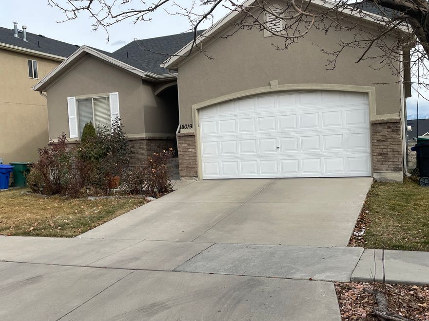 Welcome home to a warm and inviting rambler tucked into a quiet West Jordan neighborhood minutes from everything you need. Inside, you'll find a spacious first floor with its own laundry and 3 big rooms. The basement offers its own kitchen, laundry, and a walk-out basement. Perfect for multi-family. Seller is motivated and ready to go! Home is sold as is. Small dogs in the home-please allow at least 2 hours' notice for showings so they can be secured. Please bring your best offer. No Showings on Sundays. Showings from Monday to Saturday from 12 pm to 6 pm. No showing until the Open House 2/28/26.