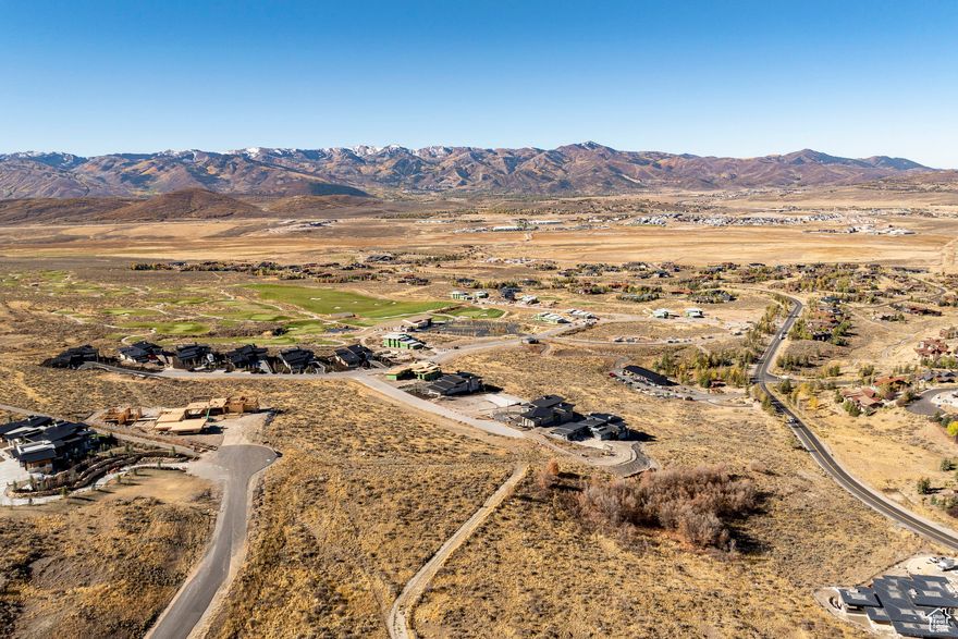 Build your dream home in one of Promontory's most prestigious neighborhoods, Elk Ridge. This homesite sits high on the hill, offering incredible ski mountain views. It also has elevated views of several holes of the front nine of the Pete Dye golf course. This premier location in Promontory, surrounded by new, sophisticated, modern homes, sits on a quiet, private cul de sac, close to hiking trails, the Beach Club, and the new Sage Hills clubhouse. It is also just a few minutes from Promontory's equestrian gate, with easy access to Deer Valley and Park City Mountain Resort skiing and Park City's Historic Main Street. The homesite is almost two acres, with a generous building envelope of just under an acre. The Promontory Club has amenities for everyone in your multigenerational family, with swimming pools, a luxurious new spa, 30+ miles of trails, and ski lodges at Deer Valley and Park City Mountain resort. Membership must be approved by the Promontory Club.