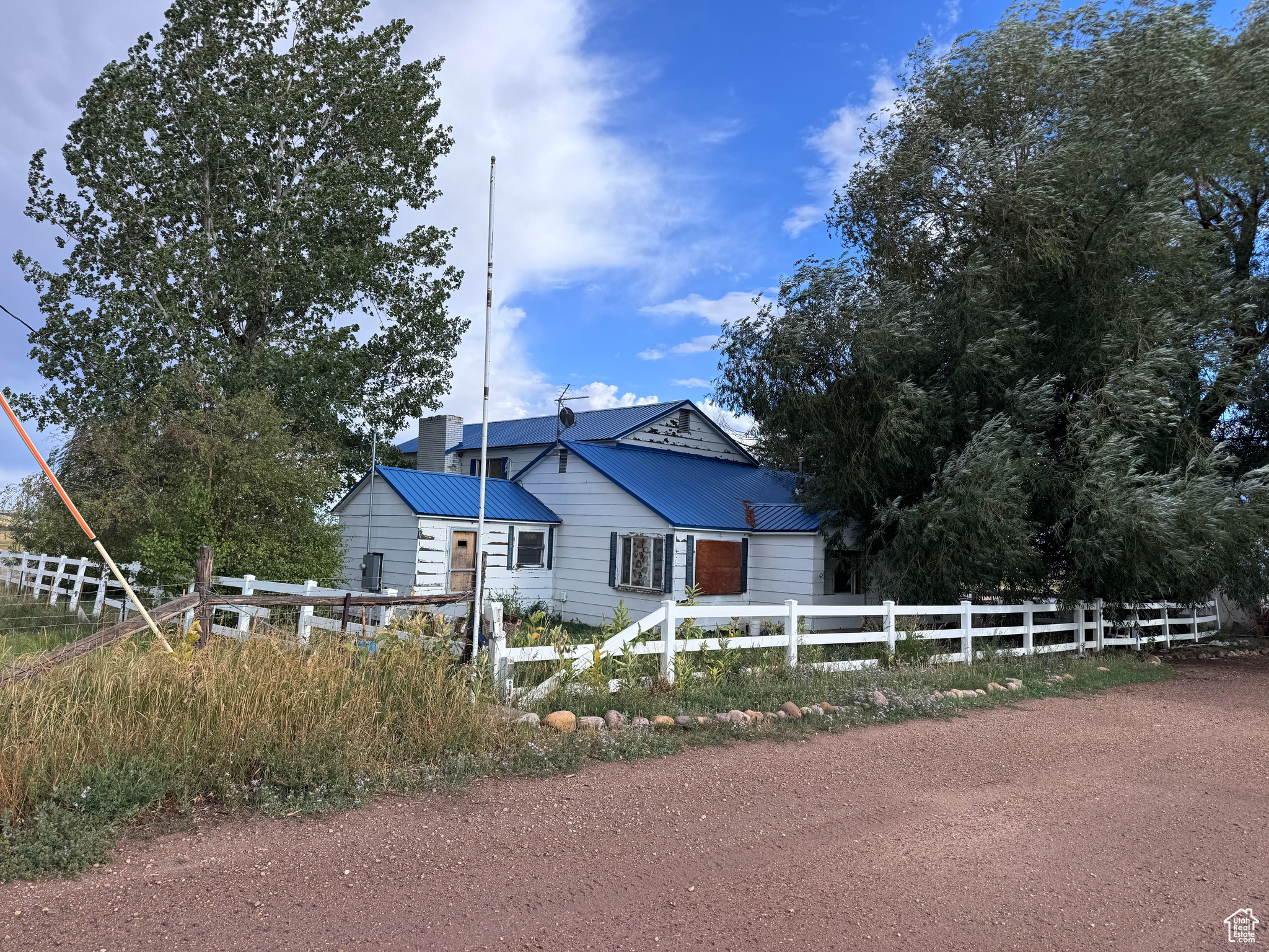 Beautiful surroundings await in Altonah. 5 bedroom, 3 bathroom home. Could be used as a hunting lodge, etc. Home is being sold in as is condition. Zoning is out of compliance. According to title, the home can be sold and title will be insured under new owners name, but there will be a clause on the title stating that it is out of compliance with zoning ordinances in the area.
