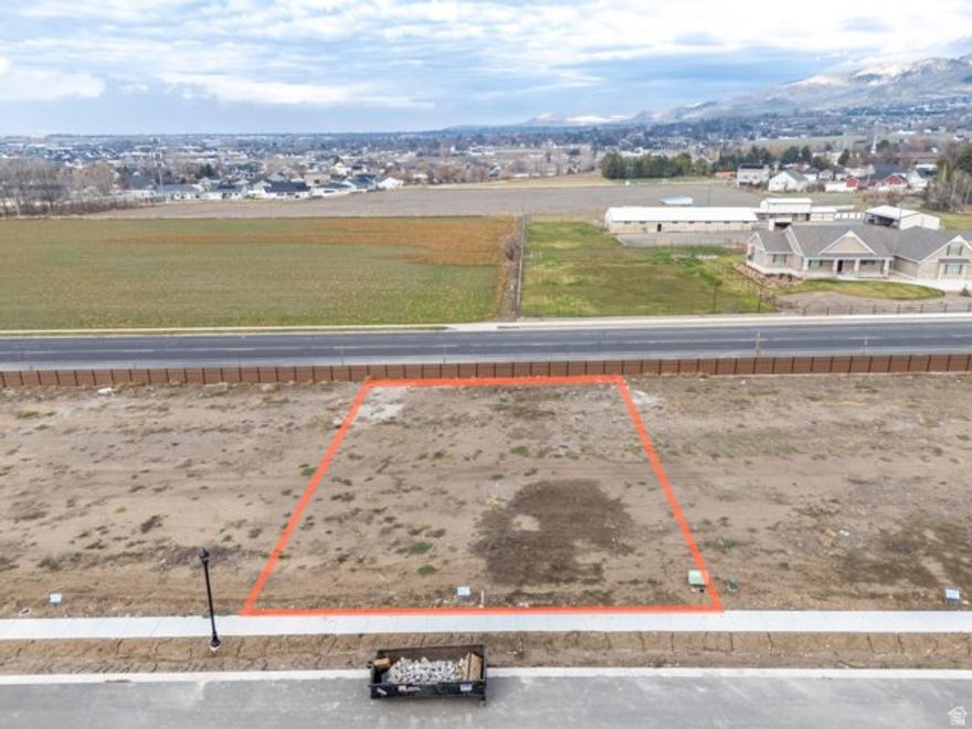 LOT 11 Smiling H Subdivision is an inviting community located in charming North Logan, Utah. This beautifully designed neighborhood offers a variety of amenities and features that cater to any lifestyle. Residents can enjoy the nearby recreational activities, including pickle ball courts, a splash pad for fun on warm days, and even an ice rink for winter sports enthusiasts. A public library and a police department nearby enhance the community's convenience and security. Families will appreciate the close proximity to schools, making it easy for children to access quality education. Additionally, every building lot is equipped with secondary water connections which is a big saver for the overall water bill. The availability of high-speed fiber internet provides residents with excellent connectivity for work and leisure. The fiber internet bill is part of the low monthly HOA fee of $65. Overall, Smiling H Subdivision offers a harmonious blend of nearby recreational opportunities and essential services, making it an ideal place to call home.