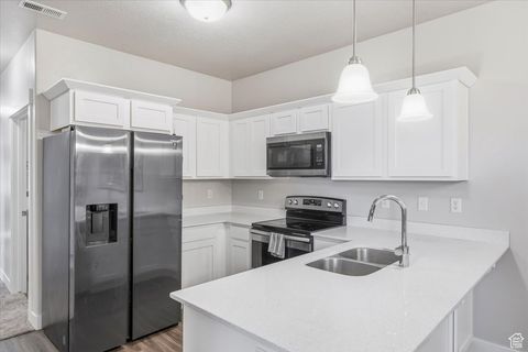 Photo of 13061 S CANNAVALE DR #B101, Herriman, UT 84096 (MLS # 2116539)
