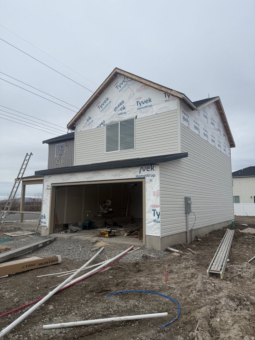 Brand-new two-story new construction in a growing community with easy freeway access while remaining in a quiet, low-traffic neighborhood. The main level features an open-concept kitchen, dining, and family room with a convenient half bath.  Upstairs includes a small loft, laundry room, three bedrooms, and two full bathrooms, including a private primary suite. Thoughtful layout, modern design, and the opportunity to own in a brand-new neighborhood-perfect for commuters and anyone looking for low-maintenance, modern living.  Buyer/Buyer's Agent to Verify