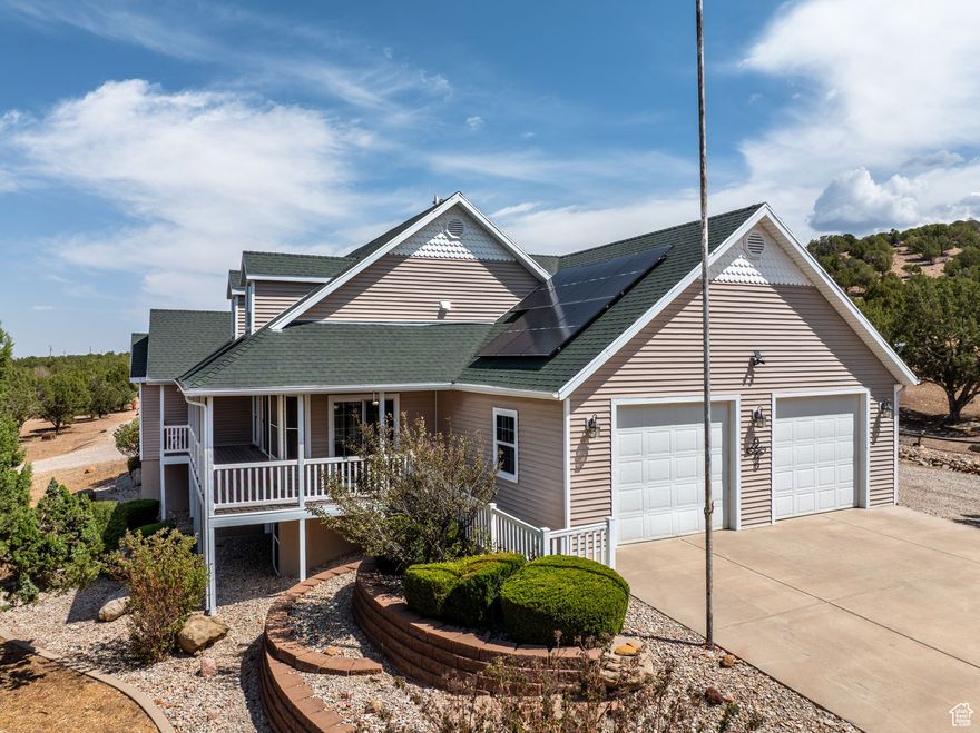 Discover a rare blend of space, privacy, and breathtaking views with this meticulously maintained 6.38-acre property. Nestled against the mountainside, the home offers sweeping western vistas - the perfect backdrop for Cedar City's magnificent sunsets. The grounds have been pristinely cared for, featuring well-manicured trees and even your own private stop light - a unique landmark that makes this property truly one of a kind. Wildlife lovers will be delighted as deer roam freely across the property, adding to its serene charm. A massive 40' x 60' steel shop provides endless possibilities for storage, hobbies, or a home-based business. The home's wrap-around deck invites you to relax outdoors and take in the views from every angle. Inside, the main floor offers 3 bedrooms and 2 bathrooms with a spacious, functional layout. The unfinished basement is a blank canvas ready to accommodate 2 additional bedrooms and another bathroom or to be customized to your vision. .5-acre ft of water included. All information is deemed reliable but not guaranteed. Buyer and buyer's agent to verify.