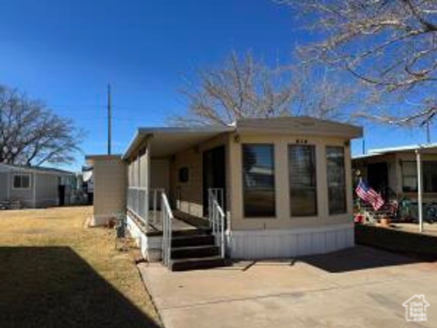 Charming 2-Bedroom Park Model in Sunny Southern Utah! This 2-bedroom, 1-bath home sits on an extra-large 0.09-acre lot with lots of windows and new blinds for natural light and privacy. Enjoy the covered back patio with a connected shed and a welcoming front porch. Located in a fun, active community with great amenities. Don't miss this perfect getaway or full-time home-schedule your showing today! Buyer to verify all information.