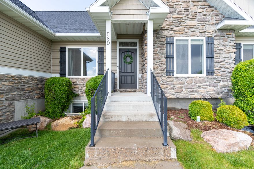 Perched on the picturesque east bench of Richmond, this charming 2-story home offers the perfect blend of comfort and luxury. With 9 bedrooms, 4 and a half bathrooms, and a fully finished basement, there's room for everyone-and everything as well as personal space, and even dropdown stairs for more storage in the attic access!  Entertain effortlessly in the theatre room, or gather in the open-concept living spaces that flow beautifully throughout the home. The 3-car garage provides ample space for vehicles, storage, or even your weekend toys. Whether you're hosting family, working from home, or just enjoying the peace and views Richmond is known for, this home has the space and features to support every lifestyle.