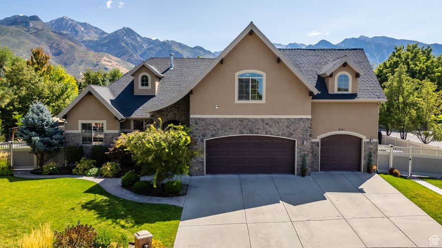 Creekside Luxury Living in Cottonwood Heights! Welcome to your dream home in one of Cottonwood Heights most sought-after neighborhoods! Nestled on a serene corner lot along the creek, this stunning 6-bedroom, 5-bathroom residence offers the perfect blend of luxury, comfort, and functionality. Step inside to find an inviting open floor plan, perfect for everyday living. Outside, enjoy your very own backyard oasis with the creek flowing, amazing mountain views, hot tub, mature landscaping, and room to relax or host gatherings. RV parking and a spacious 3-car garage provide all the storage you need. Close to top-rated schools, trails, ski resorts & freeway access.  Lots of negotiable items: hot tub, pool table, poker table, both basement wine fridges, & sauna, much more negotiable. Buyer & Buyers agent to verify all information.