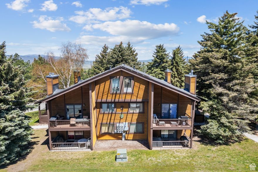 Discover the perfect blend of alpine serenity and ideal mountain and city access in this beautifully upgraded top-floor condo at Red Pine, one of the most ideally located communities in Canyons Village. Surrounded by mature pines and just a short walk to the bus stop on 224 or the vibrant Village center, this home offers a rare combination of tranquility and connection. Step inside to a warm, inviting space with fresh finishes and a modern mountain aesthetic. The main level features an open-concept great room, a spacious kitchen perfect for gathering, and a washer/dryer for everyday ease. The primary bedroom is conveniently located on the main floor. Upstairs, a thoughtfully designed sleeping loft with its own bathroom provides room for guests or family, creating a flexible space to suit your lifestyle. Whether you're unwinding by the fire or enjoying the stunning mountain views from your private deck, this condo is a true retreat. Recent upgrades include air conditioning, new appliances, and updated finishes that elevate the experience from seasonal getaway to year-round haven. Plus, with furnishings negotiable, this property could be sold completely turn-key, ready for you to move in or start generating rental income.  Red Pine offers pickleball, tennis, 2 outdoor pools, indoor/outdoor hot tub, sauna and clubhouse.